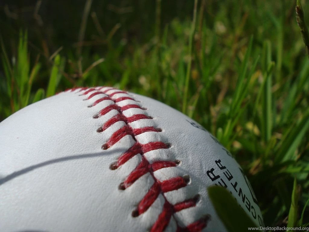 File:Baseball Showing Stitching On Grass.jpg Wikimedia Commons