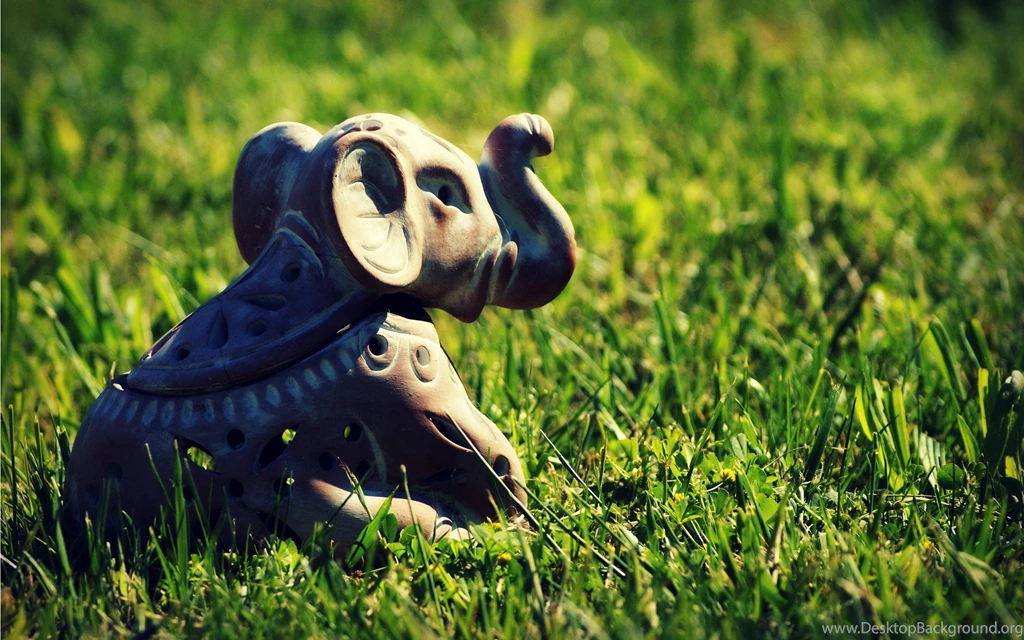 Indian Elephant Toy In The Grass Wallpapers