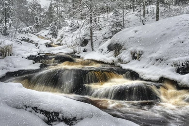 Rapid River In A Snow Storm (