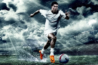 Download 1366x768 Cristiano Ronaldo Through The Rain Wallpapers
